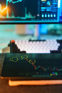 Market analysis on computer screen.